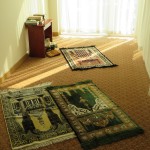 Prayer room at hotel, with rugs facing Mecca.