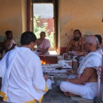 Chanting monks around a sacred fire, Karvir Peeth